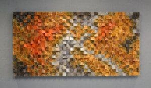 Colorful small square papers sticked on the wall