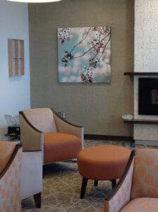 A picture of the couches near the fire place