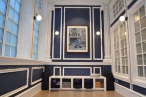 A sitting area in white and blued color scheme