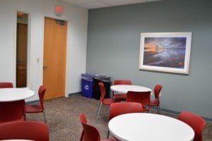 A restaurant decorated in contract of warm and cool color